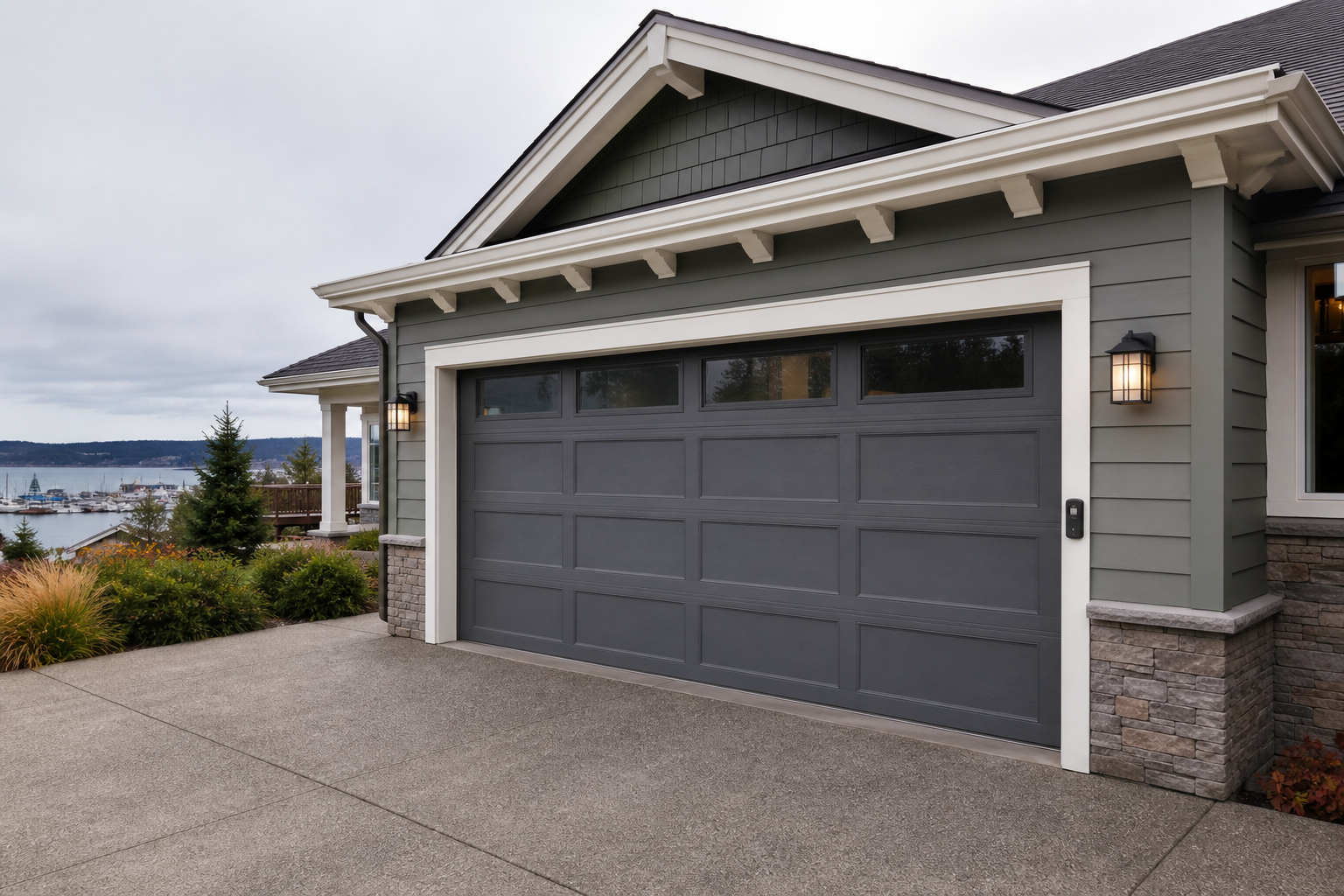 Port Townsend home with a modern garage door and smart opener setup
